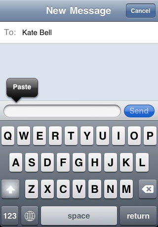 Tap on the Message field, then tap the Paste button